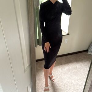 Size small black dress. Tight fitting. Nwt. Never worn